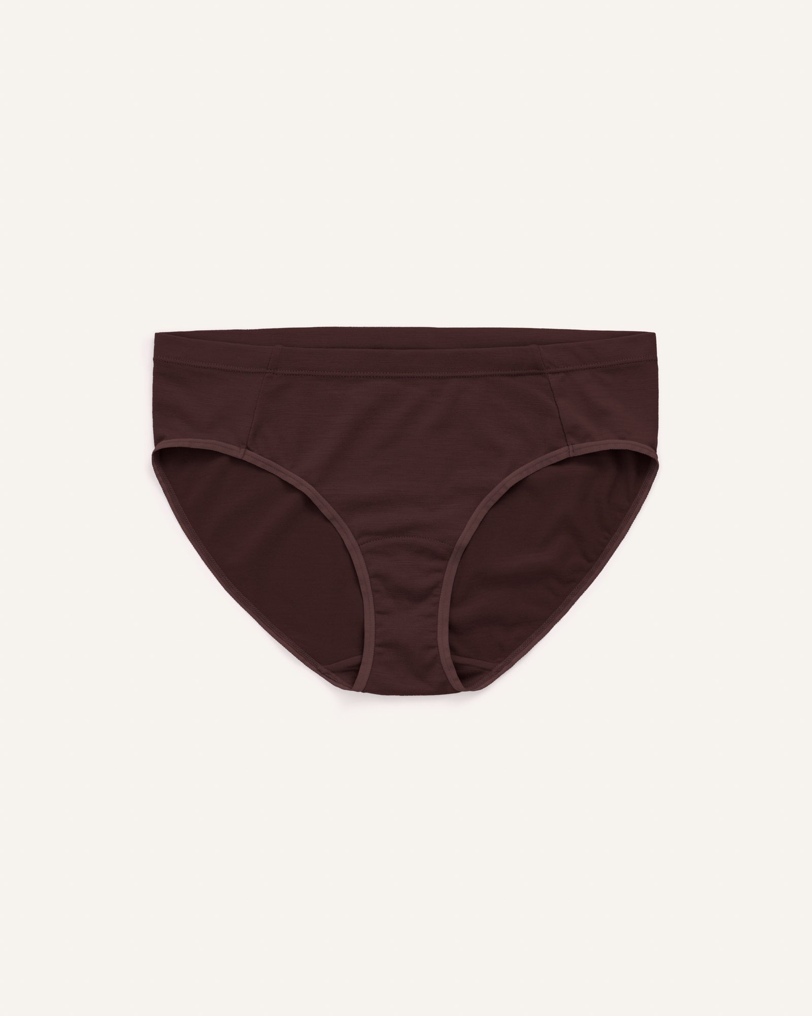 Laydown of Roam Bikini in Espresso, a dark brown color. Roam Bikini is a merino wool underwear available in sizes XS-3X.