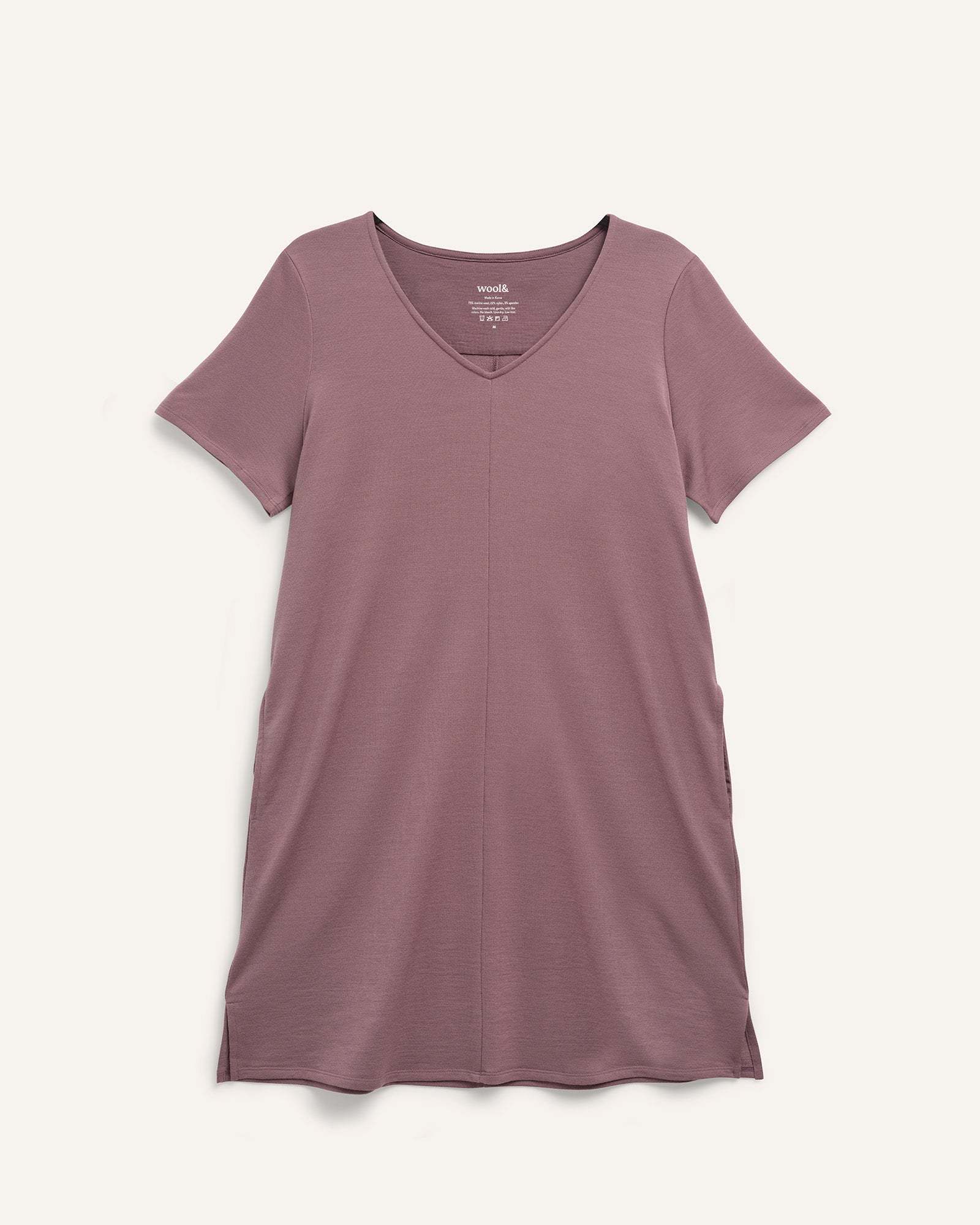 Laydown of Farrah Shift Dress in Lavender, a dusky, muted purple color. Farrah Shift Dress is a merino wool short sleeve, v-neck, knee length shift dress with pockets available in sizes XS-3X.