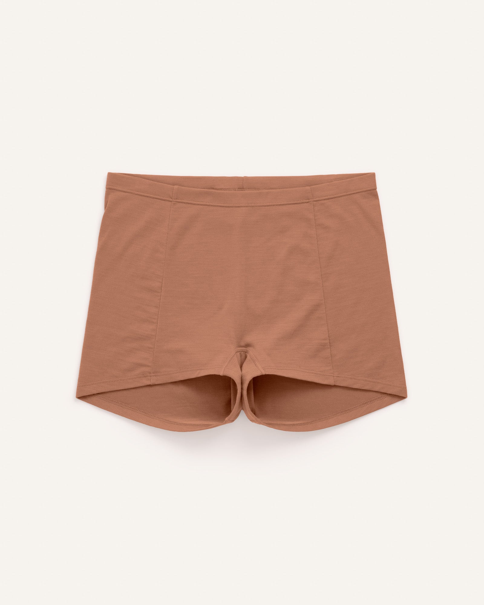 Laydown of Roam High Waist Shortie in Mocha Brown, a medium-dark nude color. Roam High Waist Shortie is a merino wool underwear available in sizes XS-3X.