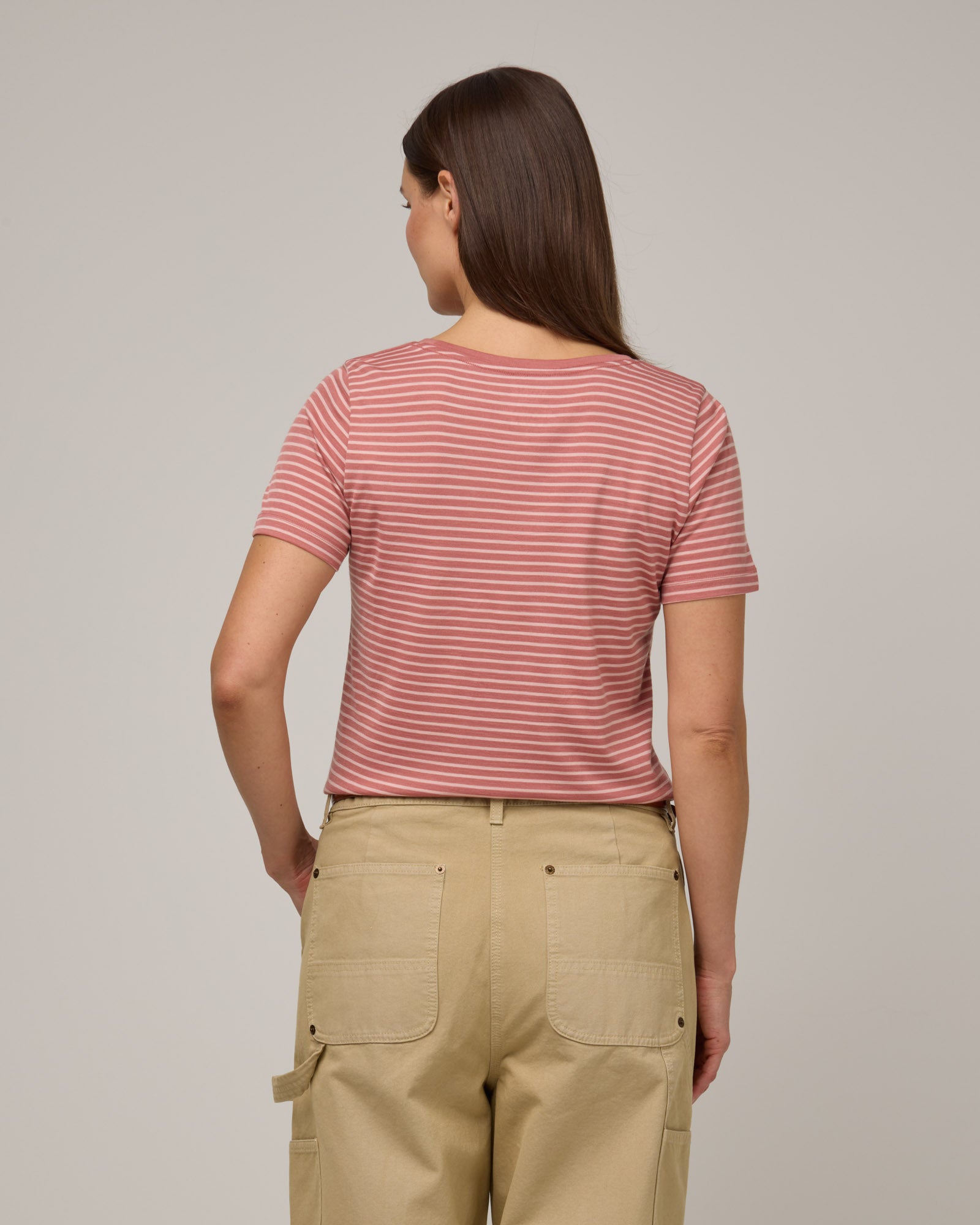 Model wearing Stella Signature Scoop Neck Tee in Vintage Rose & Blush Pink Stripe. Stella Signature Scoop Neck Tee is a merino wool short sleeve, scoop neck, relaxed fit tee available in sizes XS-3X.
