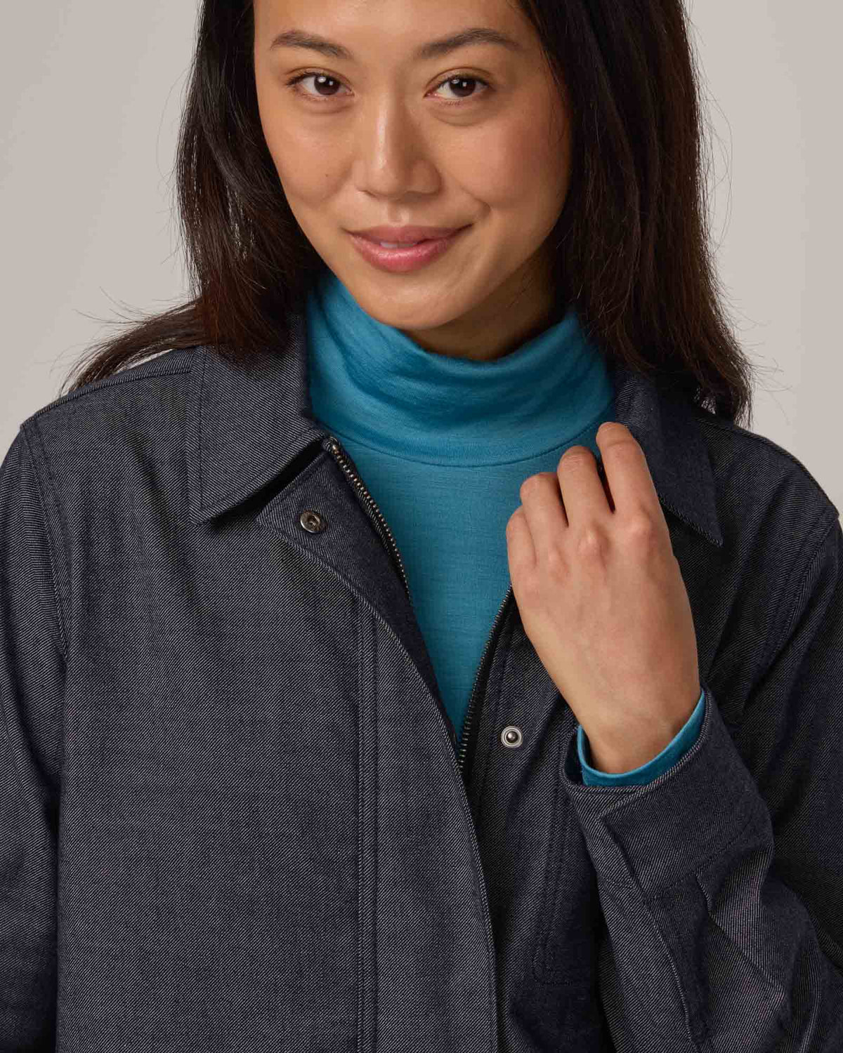 Model wearing Andi Denim Chore Jacket in Indigo Blue. Andi Denim Chore Jacket is a merino wool long sleeve, collared, relaxed fit jacket available in sizes XS-XXL.