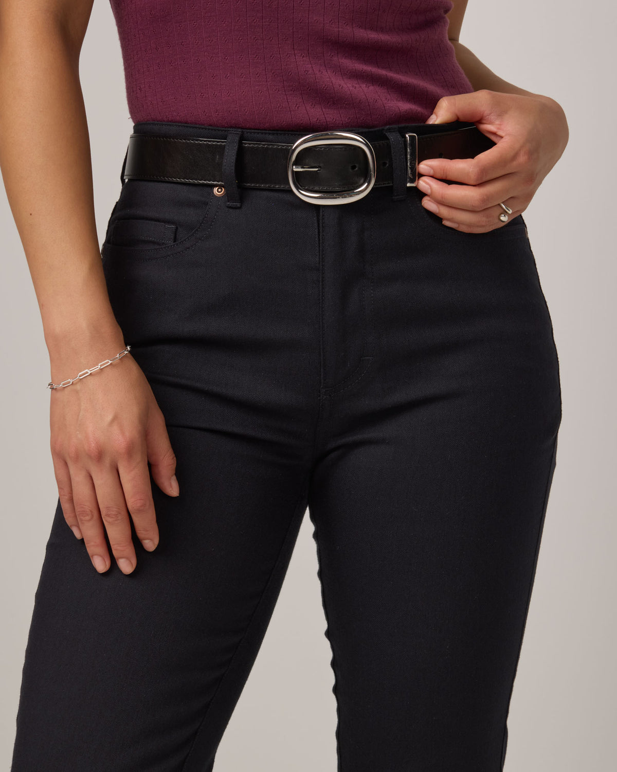 Model wearing Hawthorne Straight Leg Denim Jean in Black. Hawthorne Straight Leg Denim Jean is a merino wool jean available in sizes 26-34.