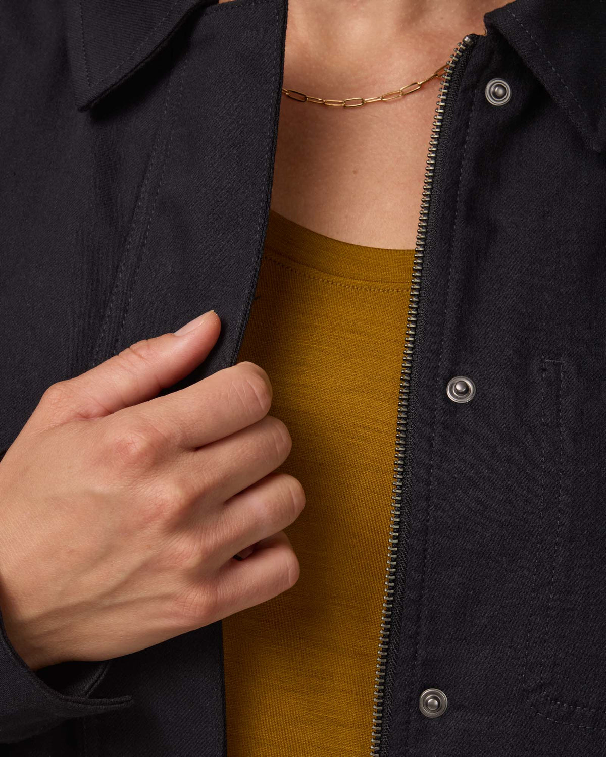 Model wearing Andi Denim Chore Jacket in Black. Andi Denim Chore Jacket is a merino wool long sleeve, collared, relaxed fit jacket available in sizes XS-XXL.